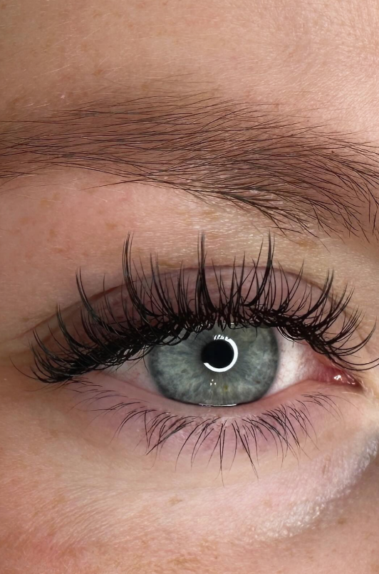 Satisfied customer with premium eyelash extensions at BeautyEra, Portsmouth